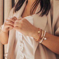 Bracelet pierre de soleil plaqué or porté